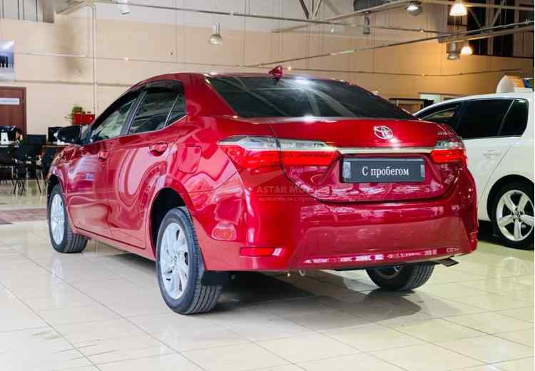 Toyota Corolla XI (E160, E170) Рестайлинг