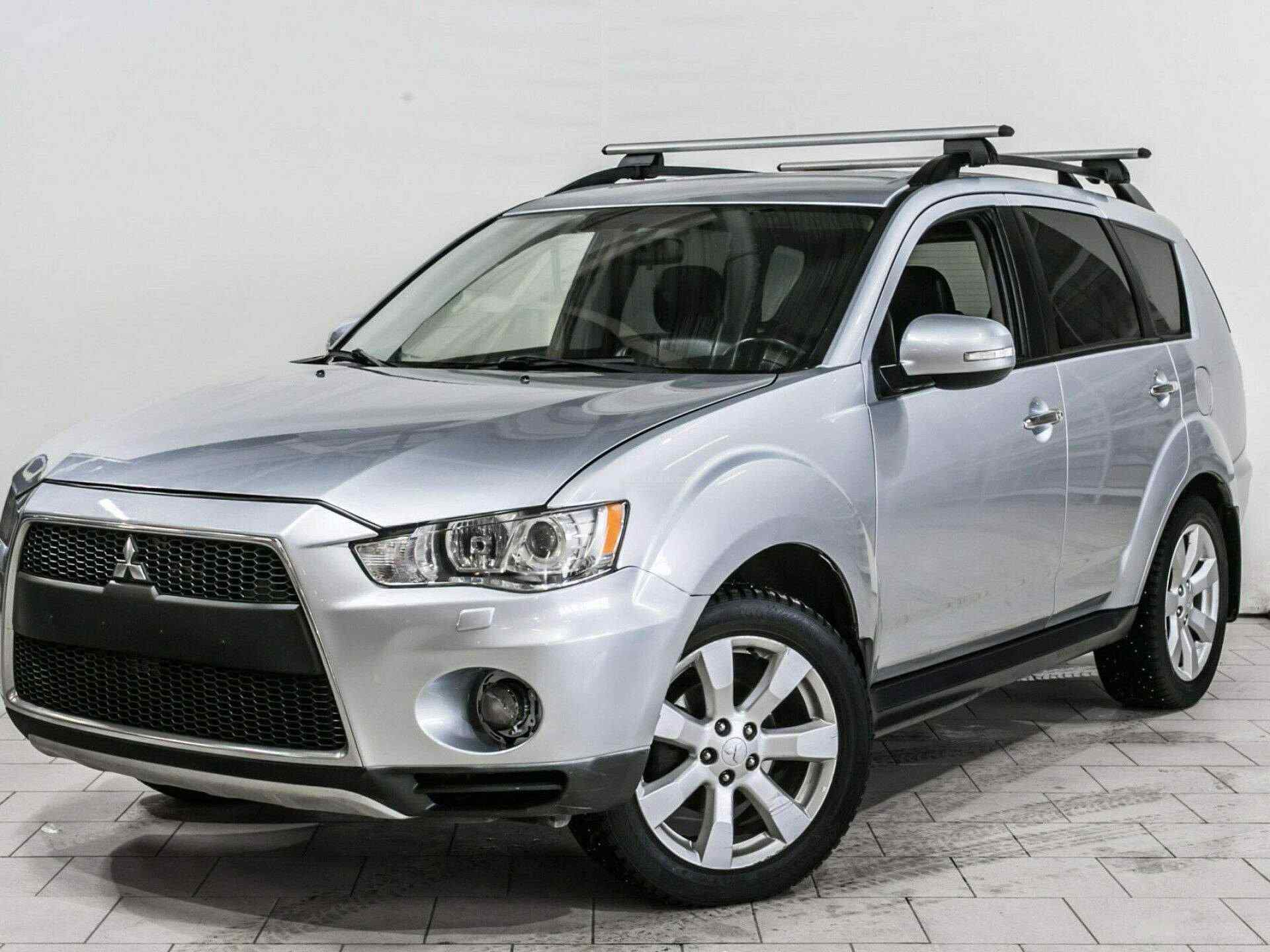 Митсубиси аутлендер 2. Mitsubishi Outlander 2011. Митсубиши Аутлендер 2011. Mitsubishi Outlander 2006 2.4. Mitsubishi Outlander 2.4 2011.